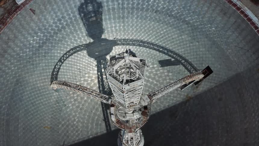 Top down aerial view of the tower at the center of a radio telescope