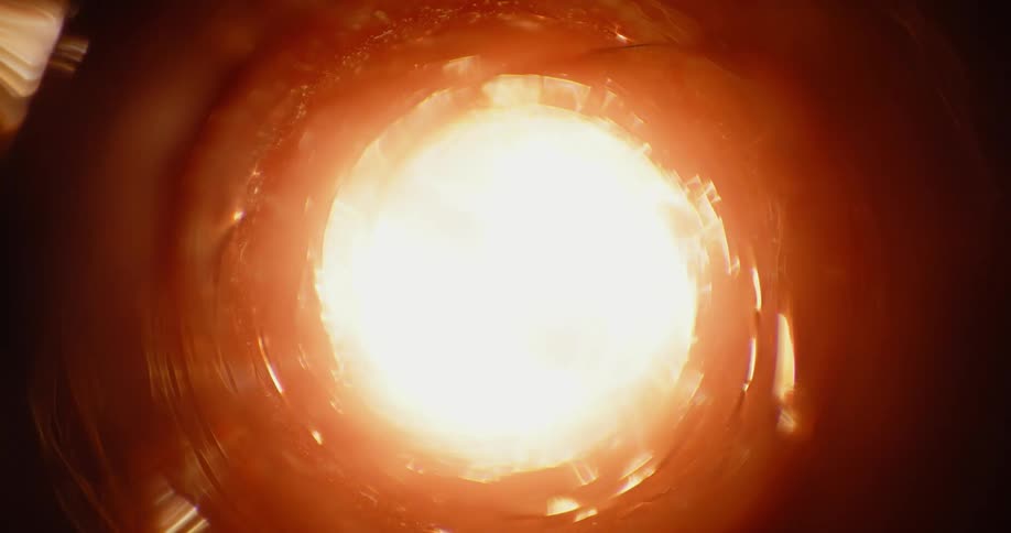 A sphere shape forms and moves away then explodes into fire