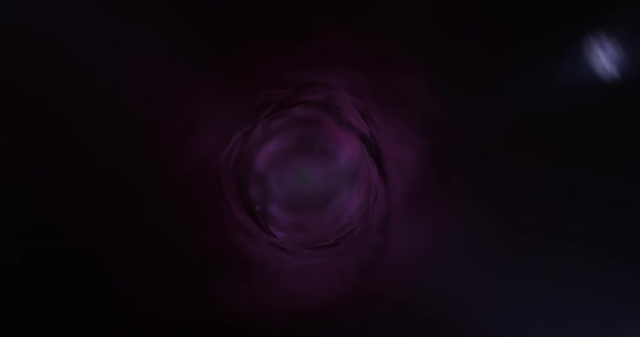 Magenta purple lights moving up and down the interior of a cylinder
