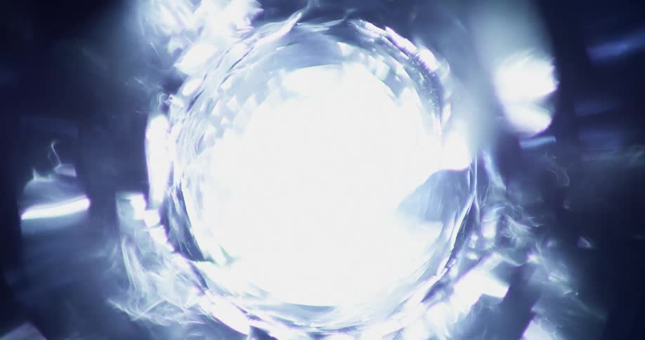 Abstract footage of a bright light shining and then turning dark