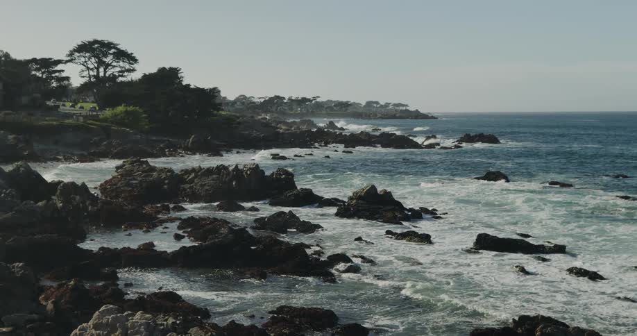 Waves crash on the rocks on the shore