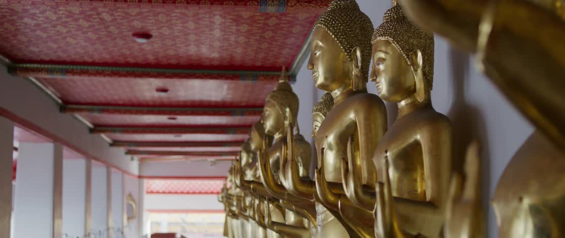 Gold statues in a building