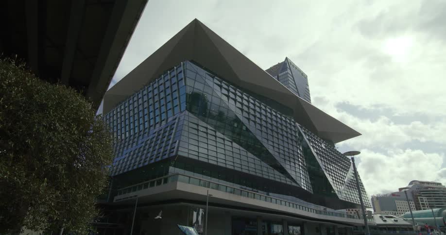 Exterior view of modern building under the clouds in the city