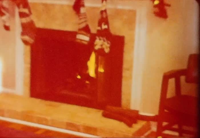 It is a video of inside someones house by the fire place
