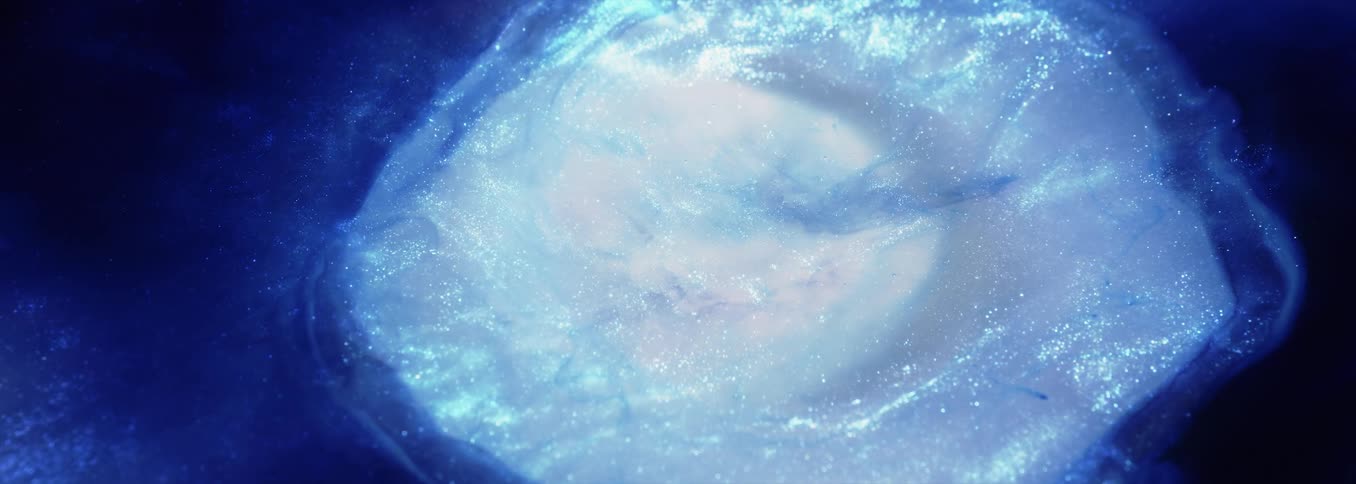 A hole spreads wider in a body of water