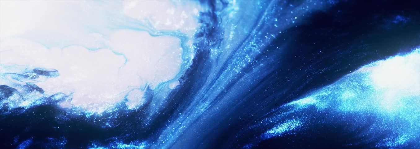 Flowing streaks of bright shimmering blue ink