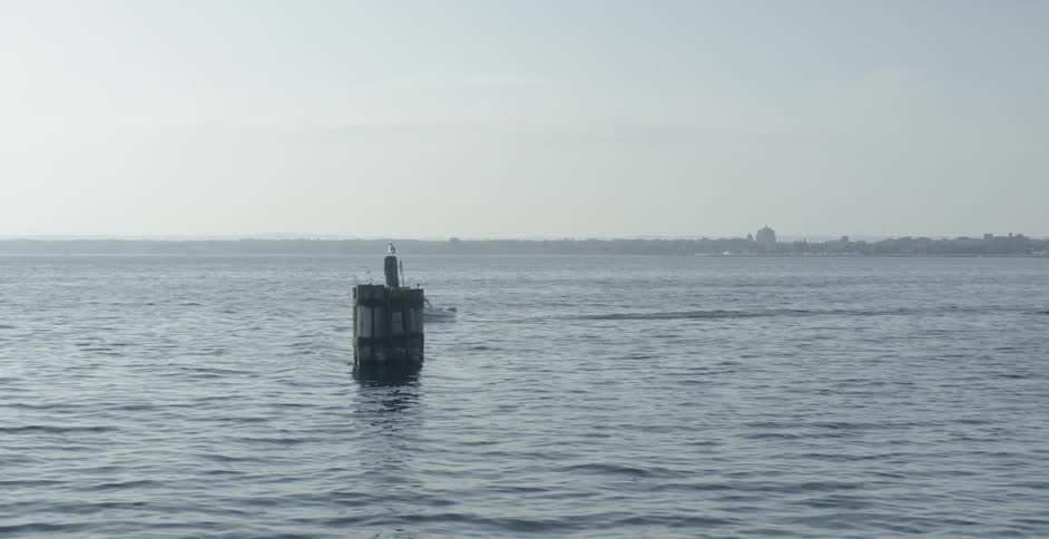 Boat and Pier in Lake Michigan Water