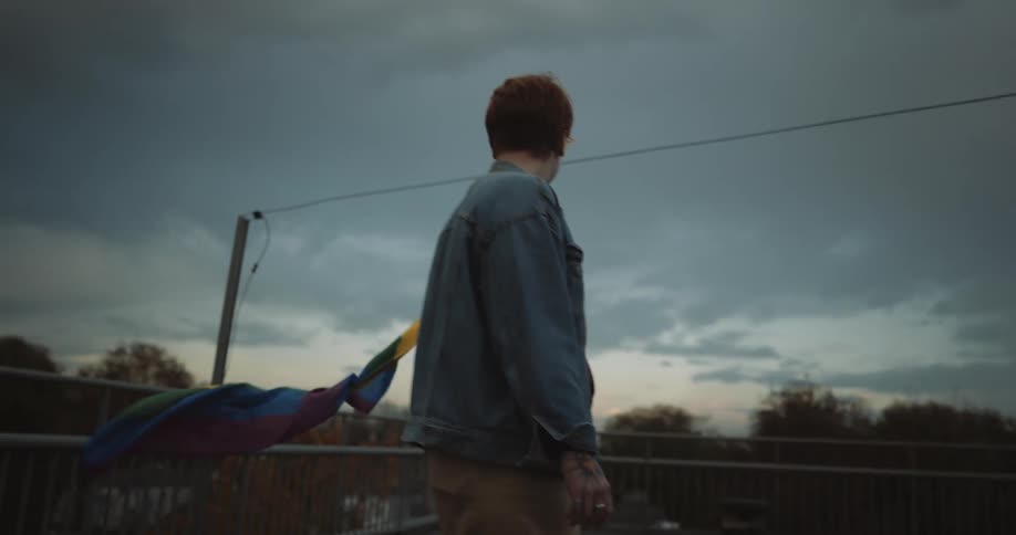 A man and woman dancing outdoors