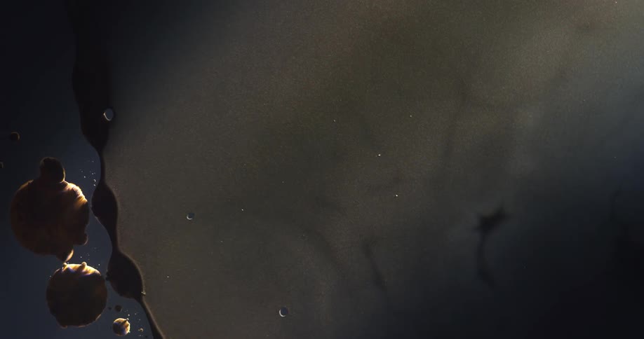 Flowing dark droplets of liquid