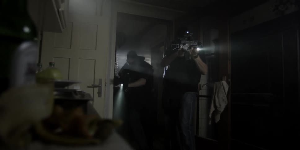A swat team searching a home