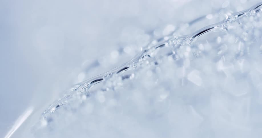 Ice reflects light as it shines across frozen surface