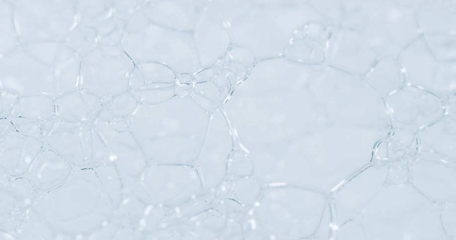 Area brightens until thick layer of soap bubbles fades
