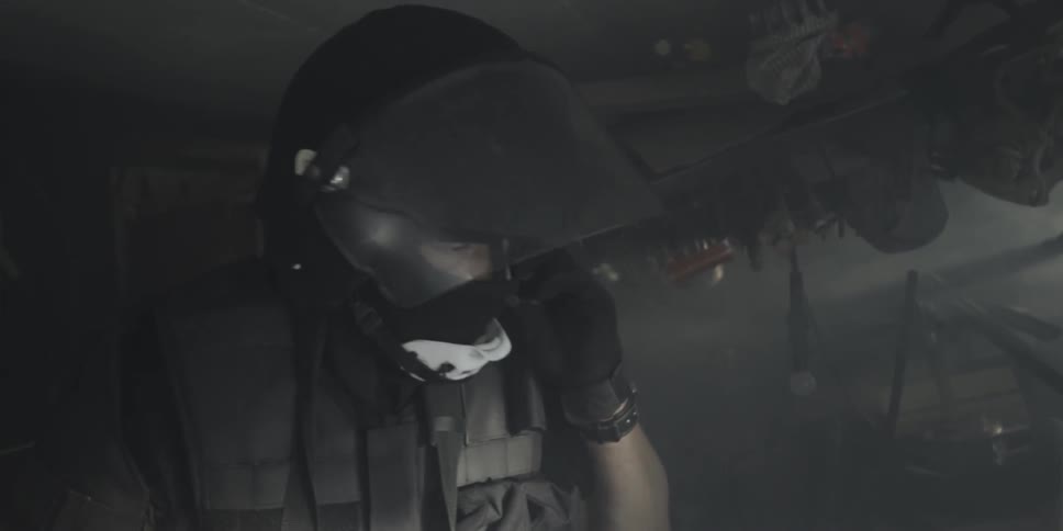 A policeman speaking into a radio