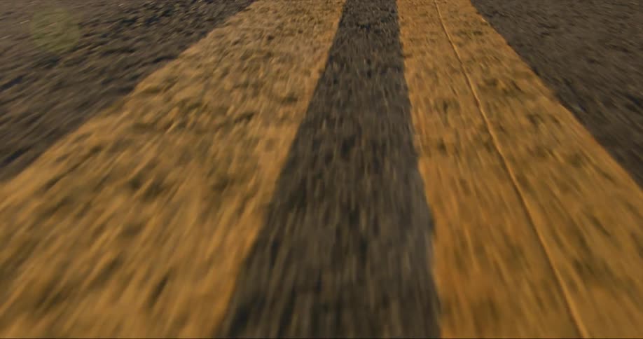Yellow road stripes filmed at a fast speed