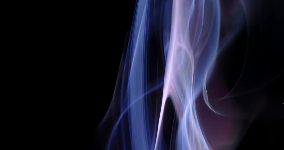 Abstract purple smoke is displayed on film