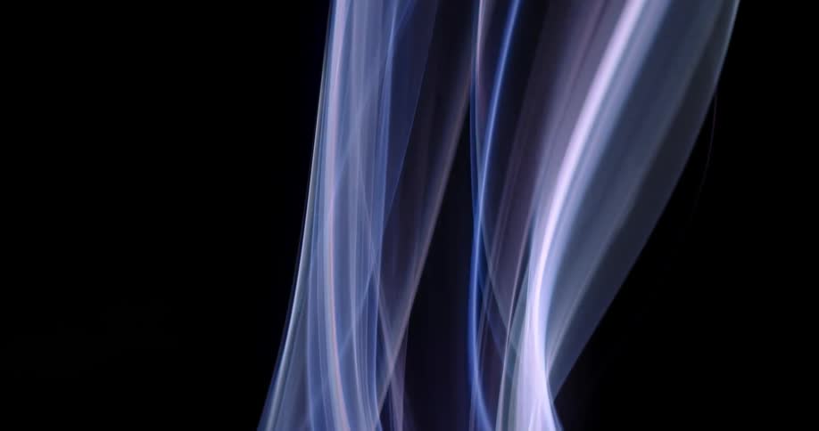 Thin sheets in blues purples and whites flow upward contrasting with black background