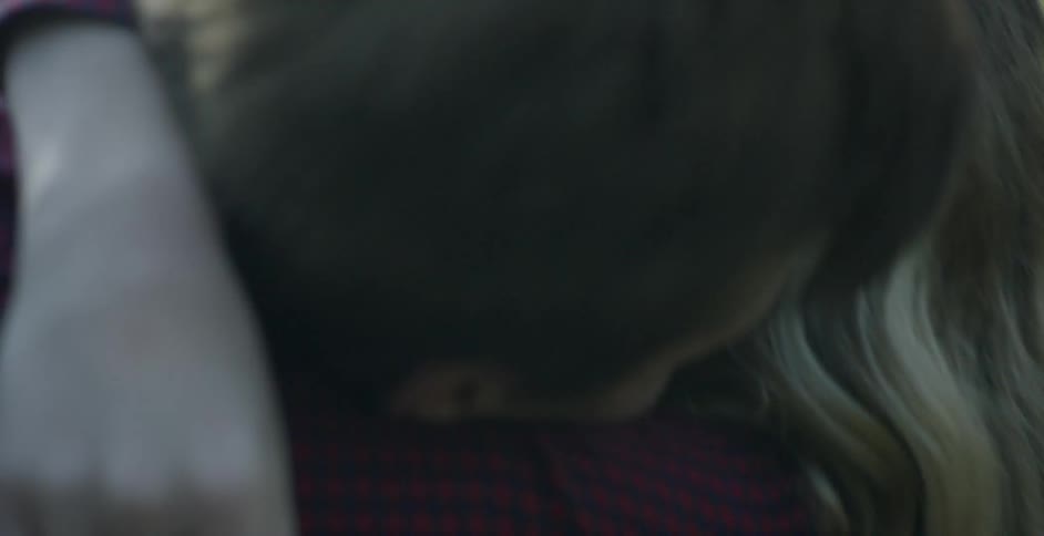 A man and woman hug and talk