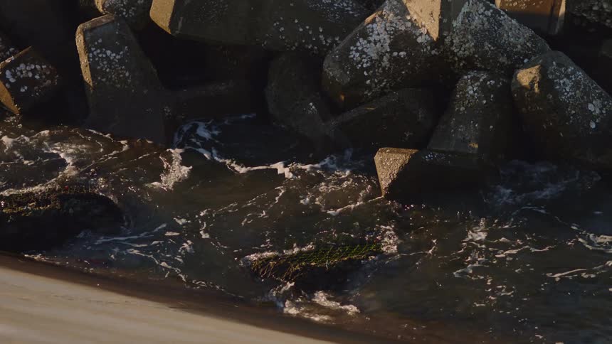 Ocean waves are crashing near the coast