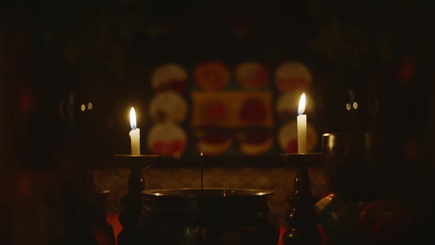 There is a candle light dinner inside of a building