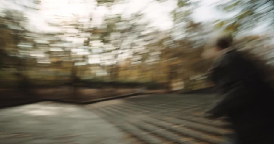 A young couple is running around in the wilderness area