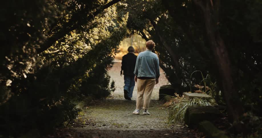 Young couple is walking outside during the day