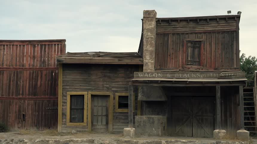 An old blacksmith shop on a quiet street of a ghost town