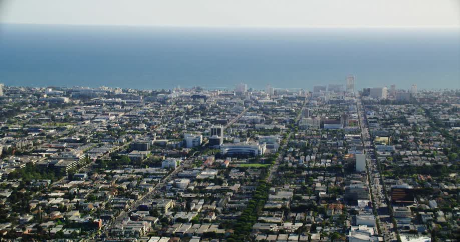 A vast metropolis on the coast during the day
