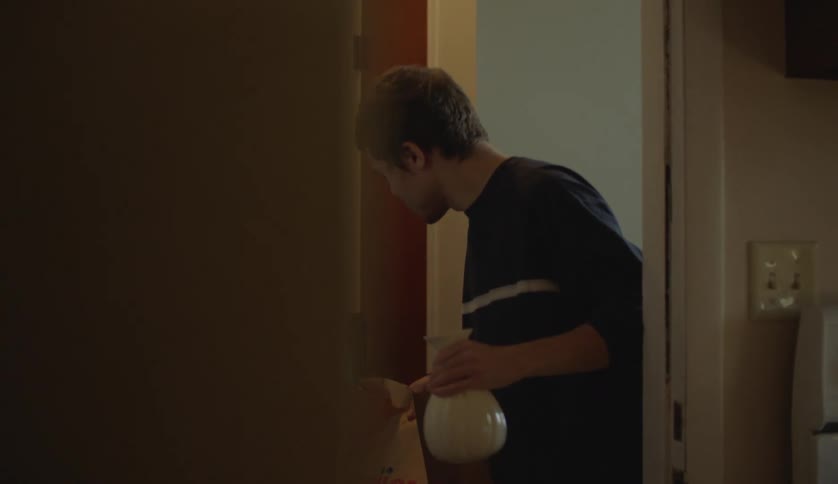 Mother and son are walking around their house
