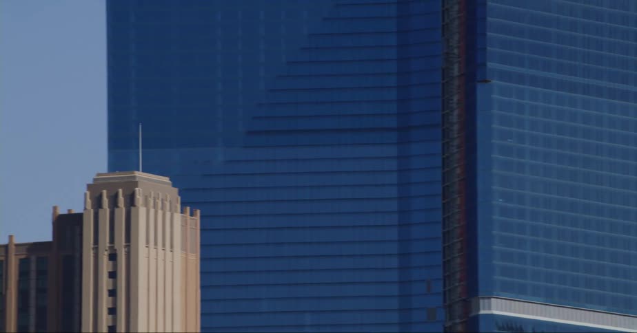 A plane is driving through an urban city