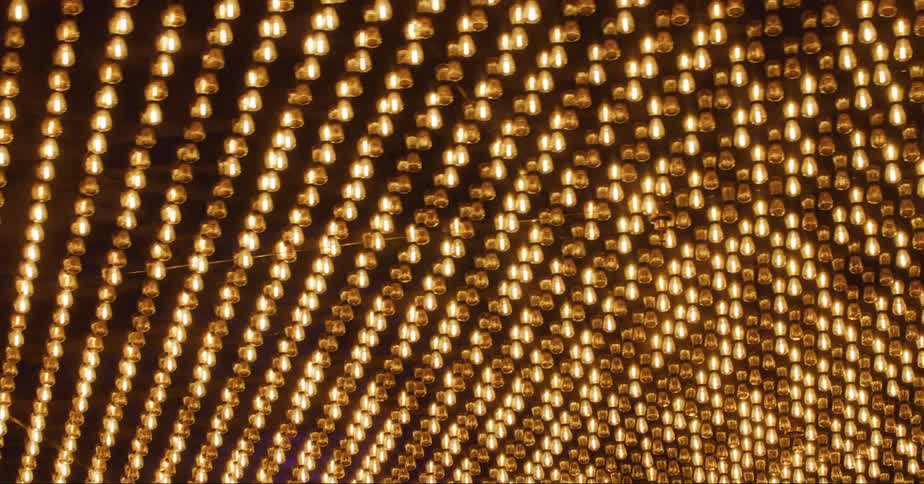 Rows of flashing yellow lights on a ceiling