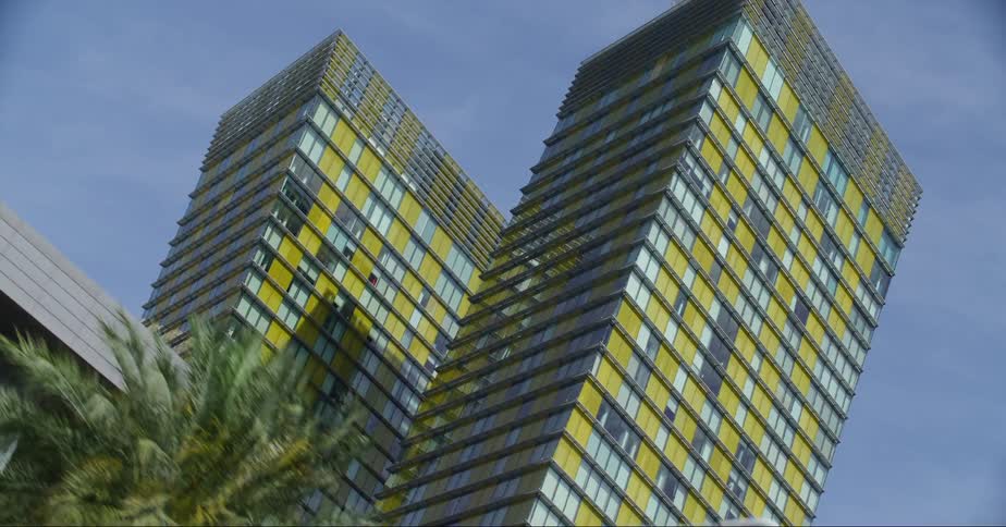 Tall buildings line the sky