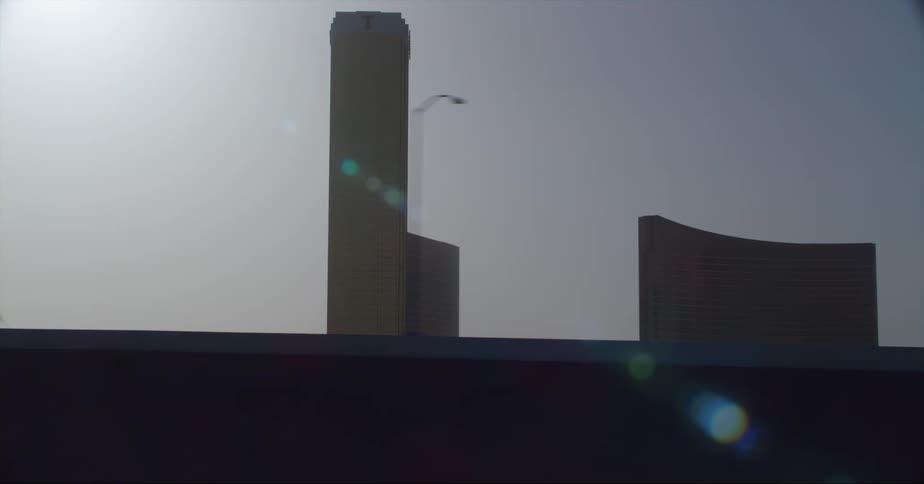 A tall row of hotels are in the city