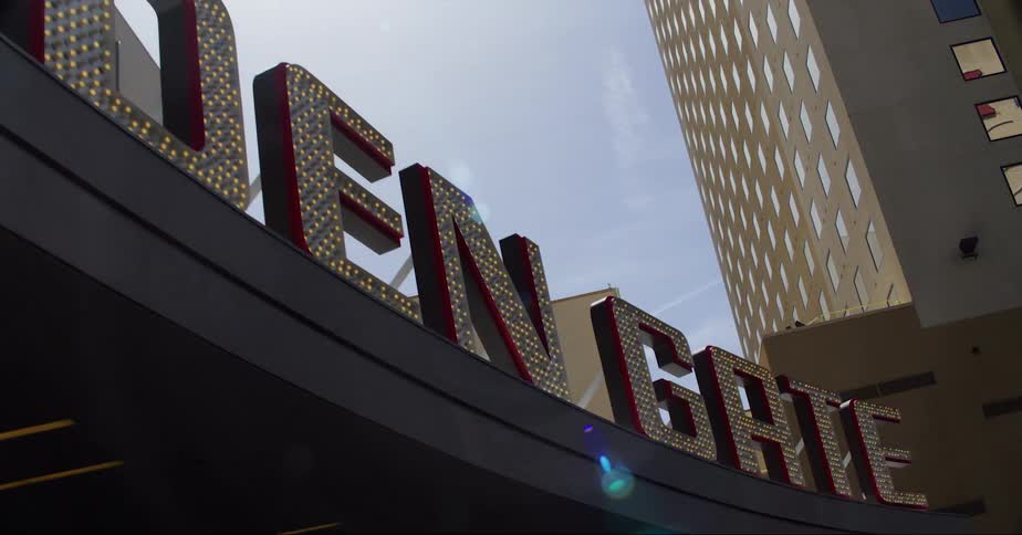 A sign outside of a hotel in a city