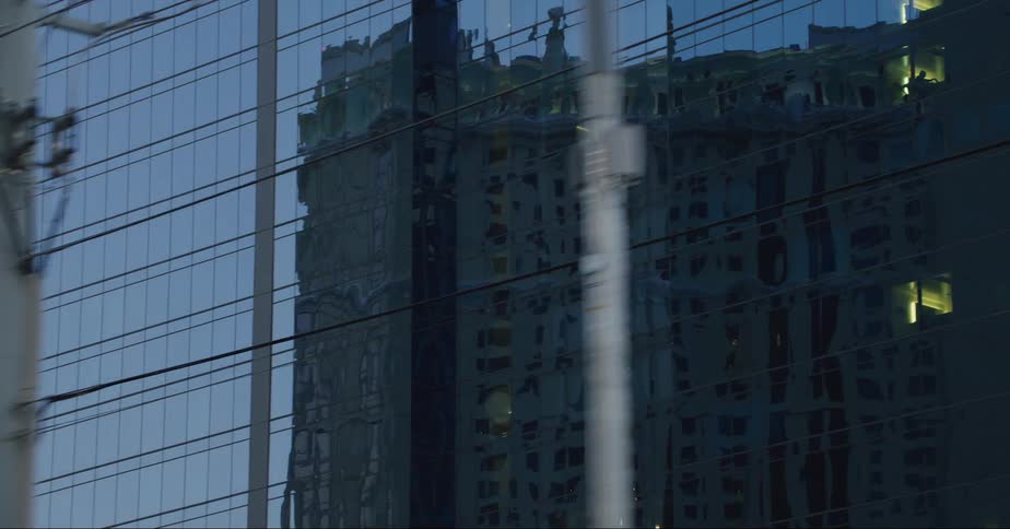 The windows reflect other buildings