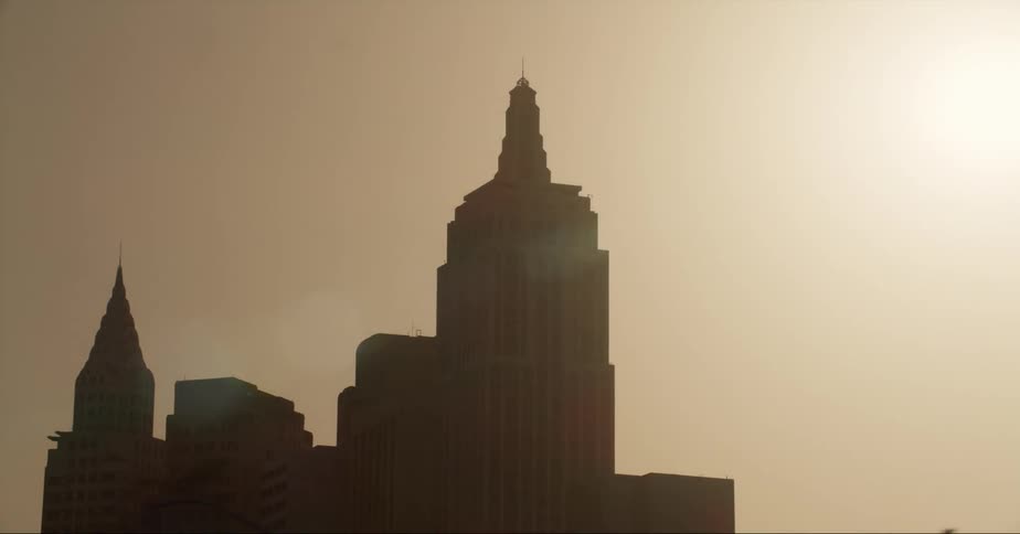 Silhouette of the empire state building scale statue in las vegas at evening
