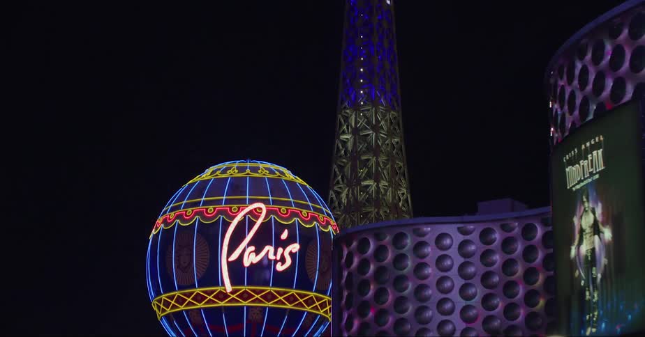 Paris balloon and eiffel tower in the skyline of las vegas at night