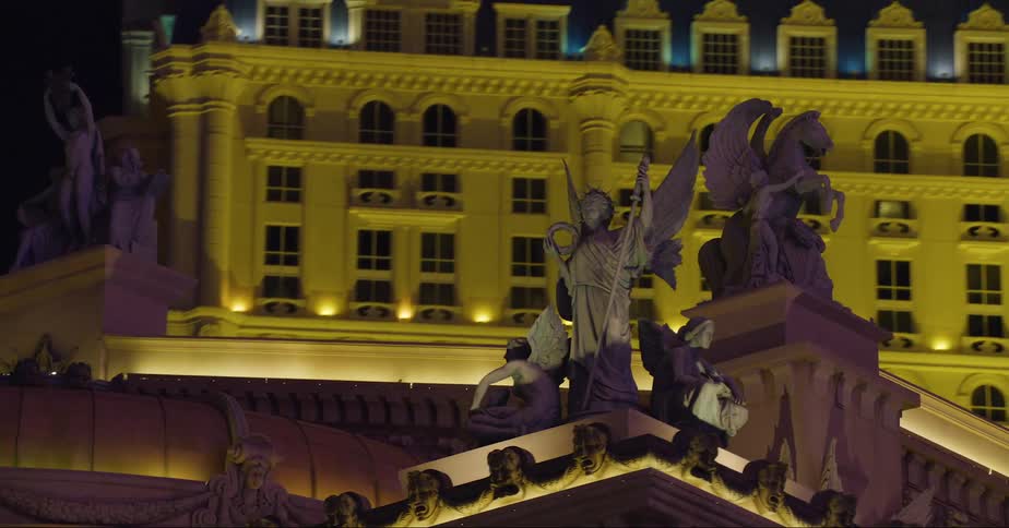 Close up view of statues on buildings is displayed
