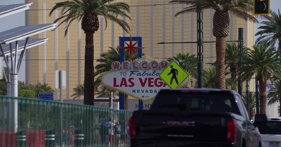 Dramatic zoom on the las vegas city sign seen from a moving vehicle