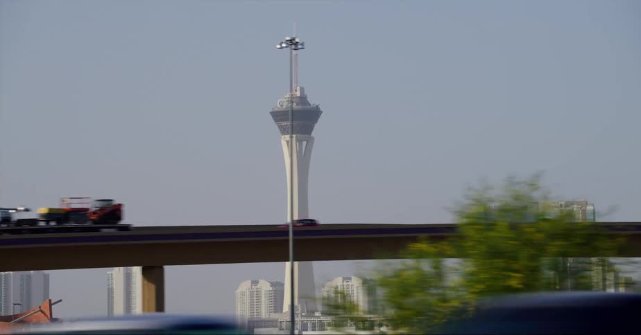 Exterior view of the strat tower and distant buildings in the city