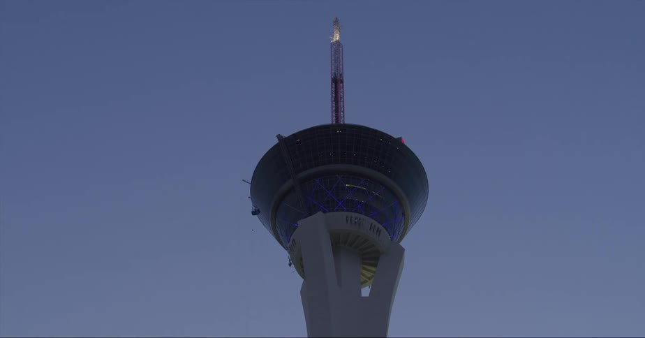 Exterior view of the strat tower against the sky at dusk