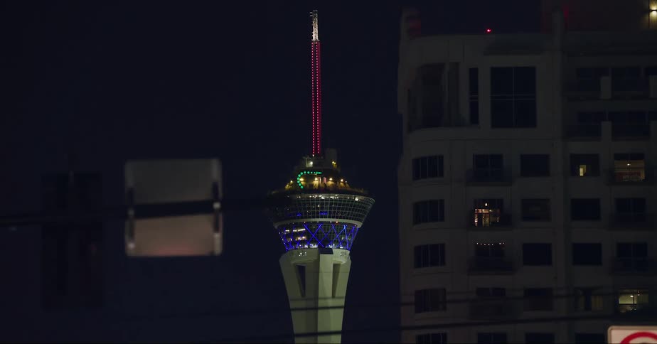 A tall tower is near the hotel