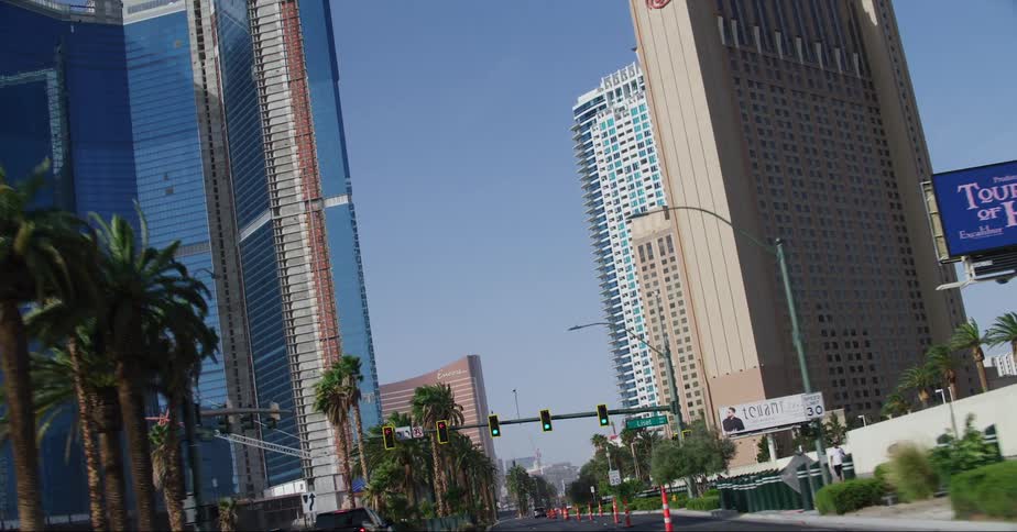 Tall buildings on the skyline of las vegas seen from a car driving on the street