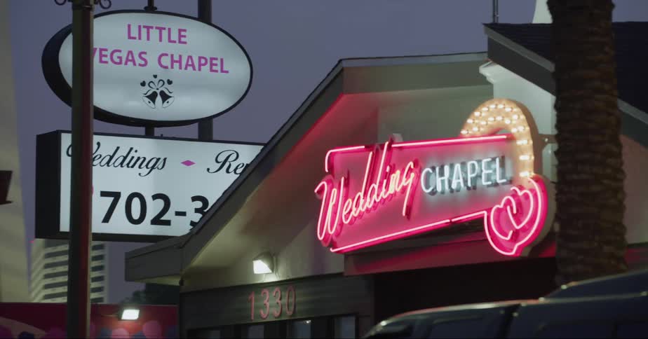 Neon sign on a wedding chapel in las vegas at evening