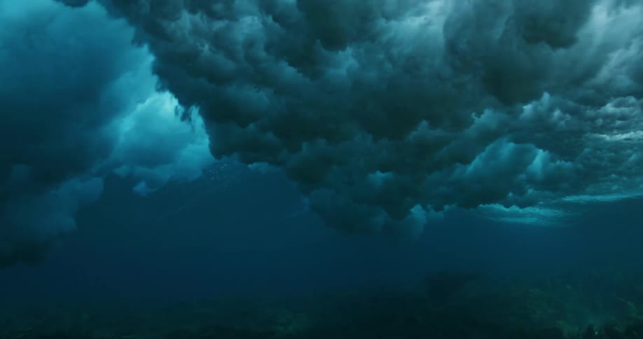 Ocean wave moves across the surface of water