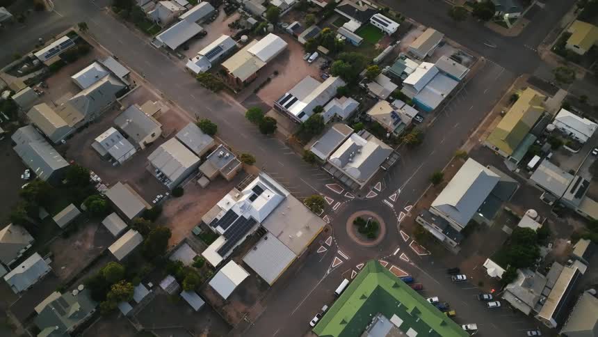 Aerial view of intersection and houses in the neighborhood