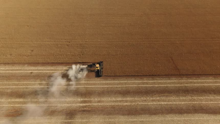 The tractor is working the field