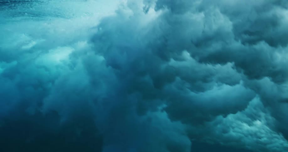 Underwater view of waves crashing in the ocean
