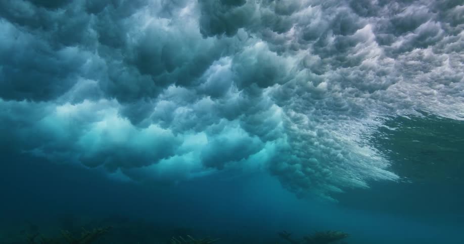 Underwater view of waves breaking from left to right