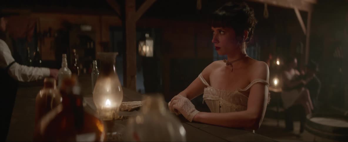 Saloon girl spots man with another girl in his lap in saloon and leaves