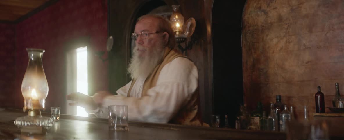 The bartender quickly ducks behind the bar